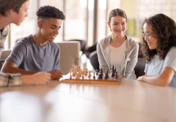 Students playing chess